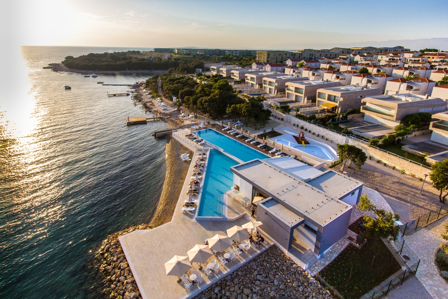 Lovely beach and swimming pools next to Sunnyside apartments